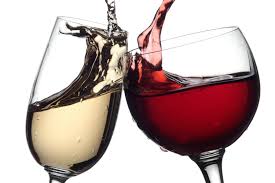 cheers - toasting red and white wine glasses